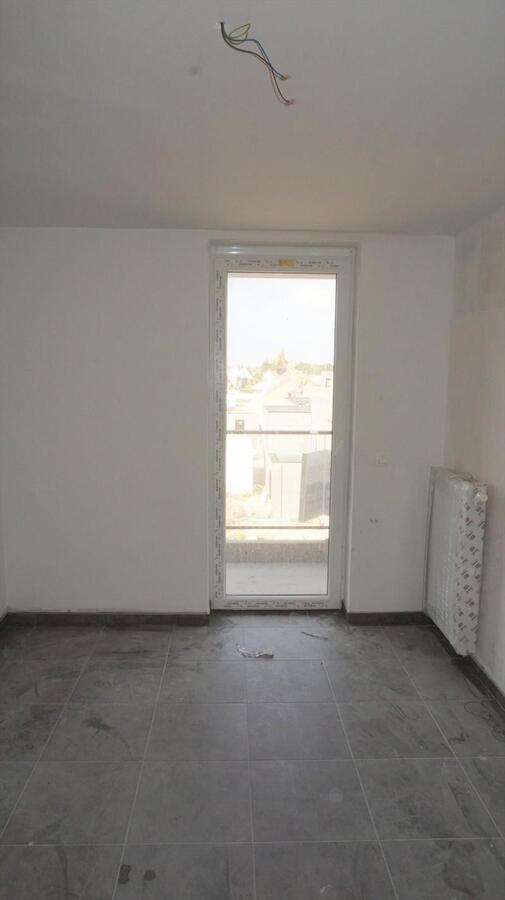Nieuwbouw twee-slaapkamer-appartement in woonproject De Barge m&#233;t ondergrondse garagebox 