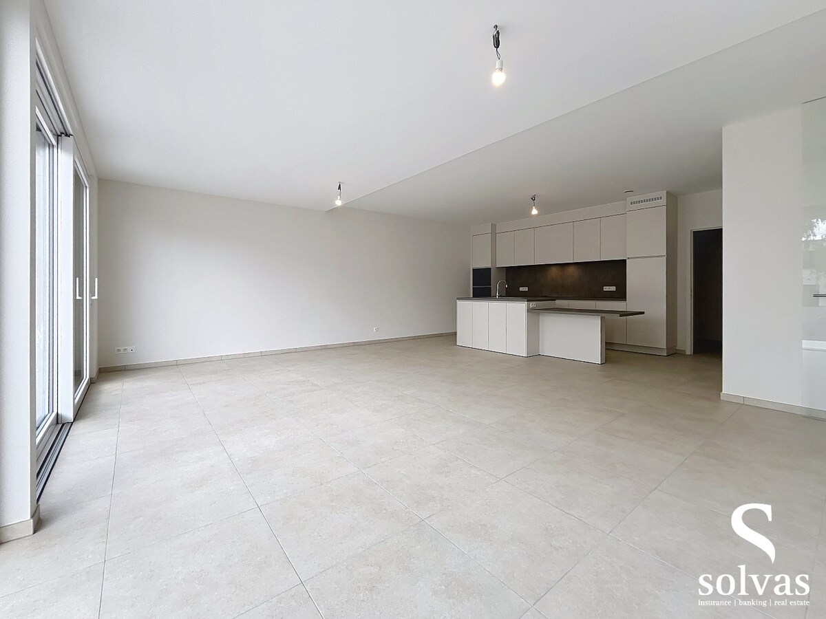 Ruim nieuwbouwappartement met tuin, terras, garage en 3 slaapkamers op prachtige locatie (Vaart) te Bellem 