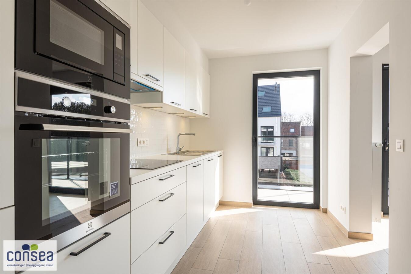 Lichtrijk appartement in het centrum van Maldegem met zicht op de kerk, zuid geori&#235;nteerd terras 