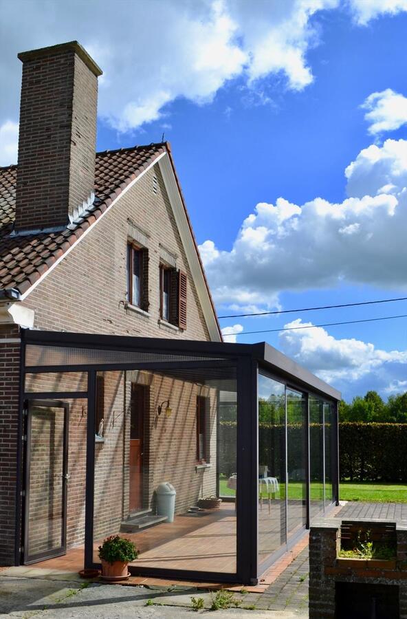 Woning met loodsen en koestal op ca. 6.423m&#178; te Oudenaarde 