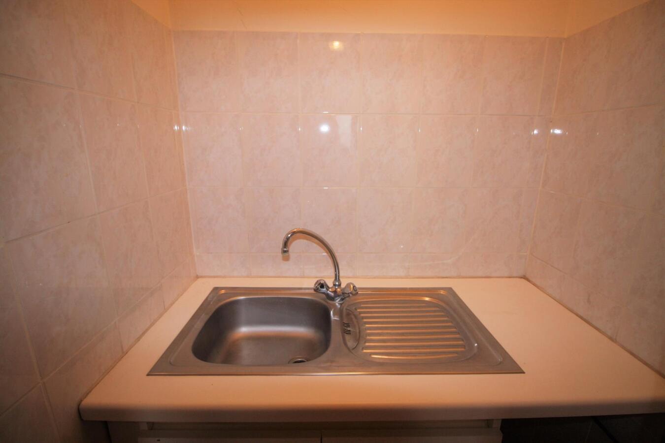 Appartement gelijkvloers met handelspand in Zedelgem 