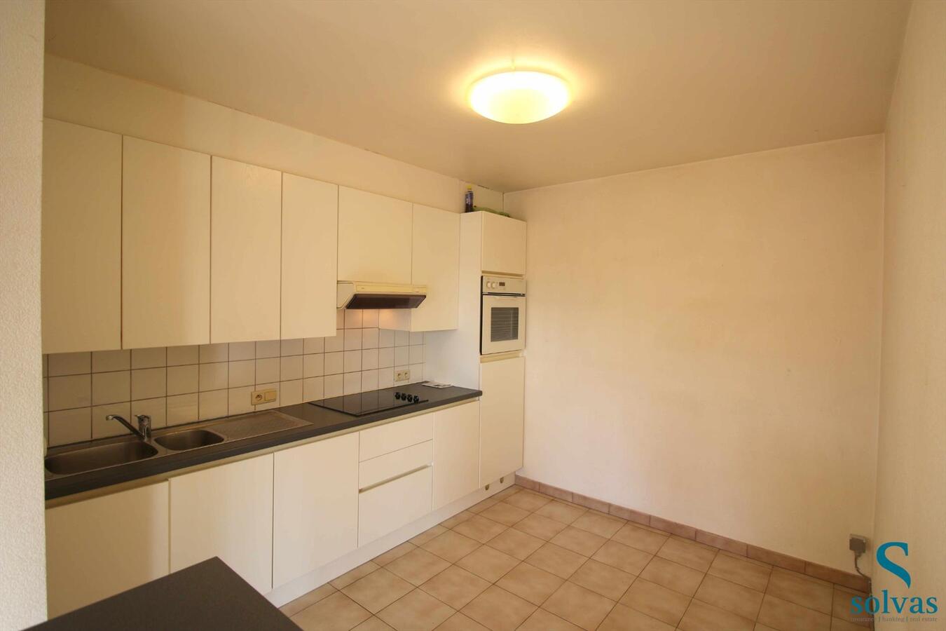 Rustig gelegen appartement met garage te Ursel! 