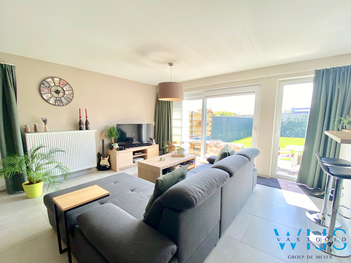 Gelijkvloers appartement met zonnige tuin &amp; dubbele garage te Sint-Laureins ! 