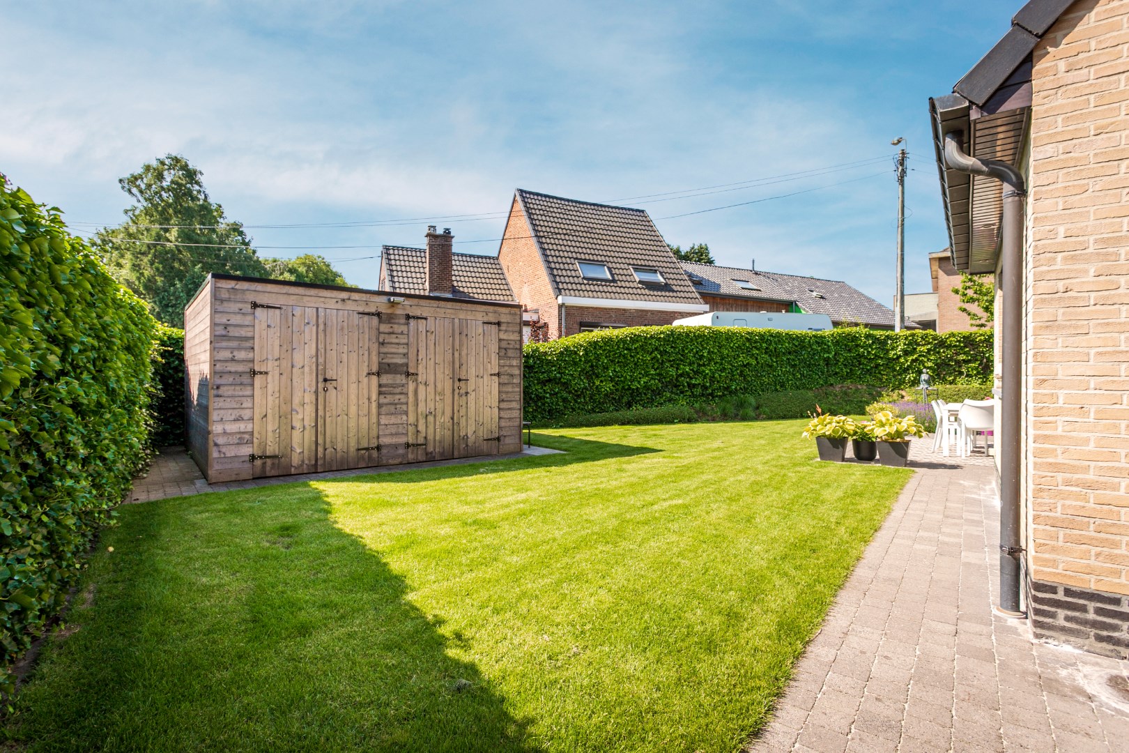 Instapklare woning met 3 slpks, garage en tuin te Halle 