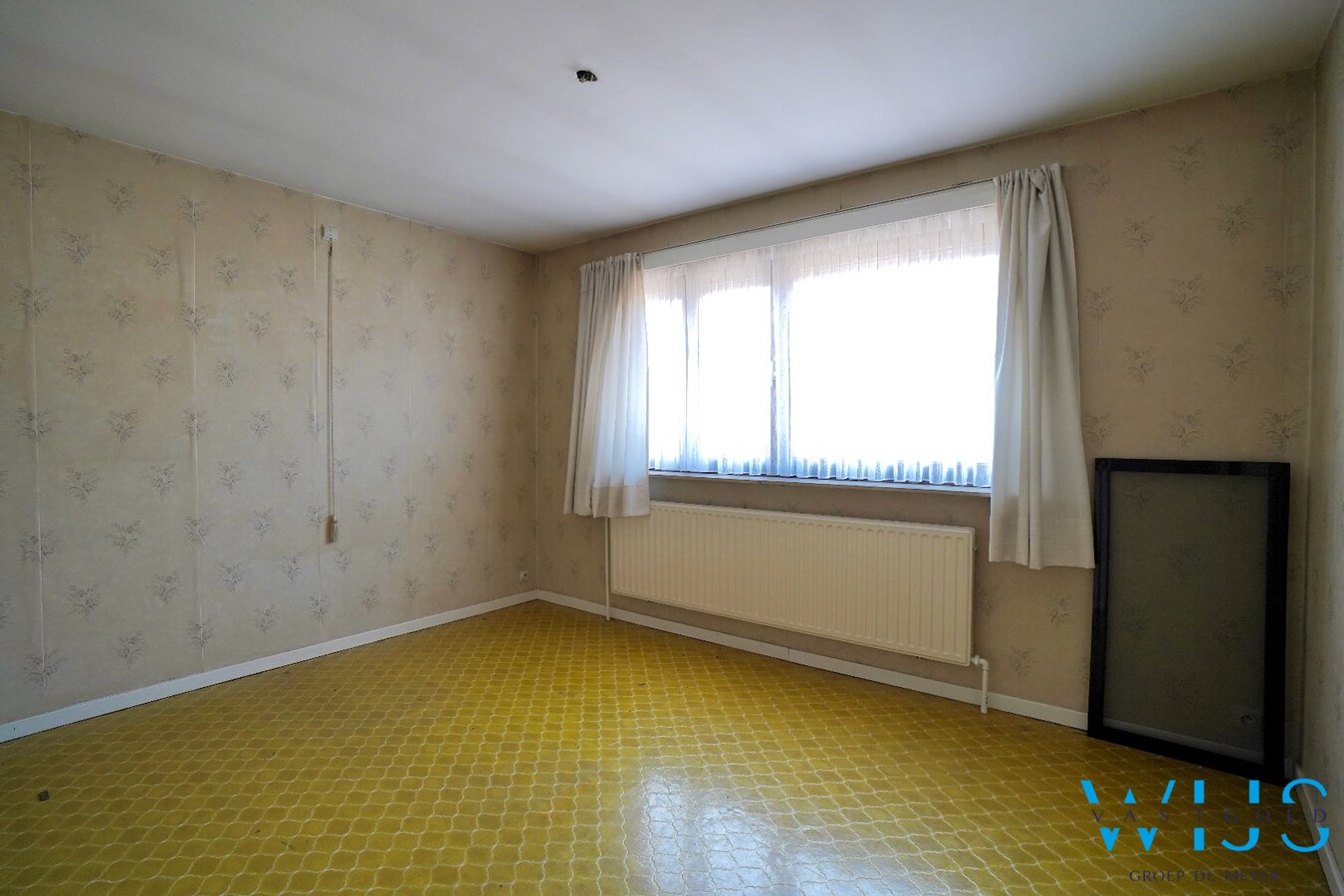 Ruime woning met handelsmogelijkheid in centrum Assenede 