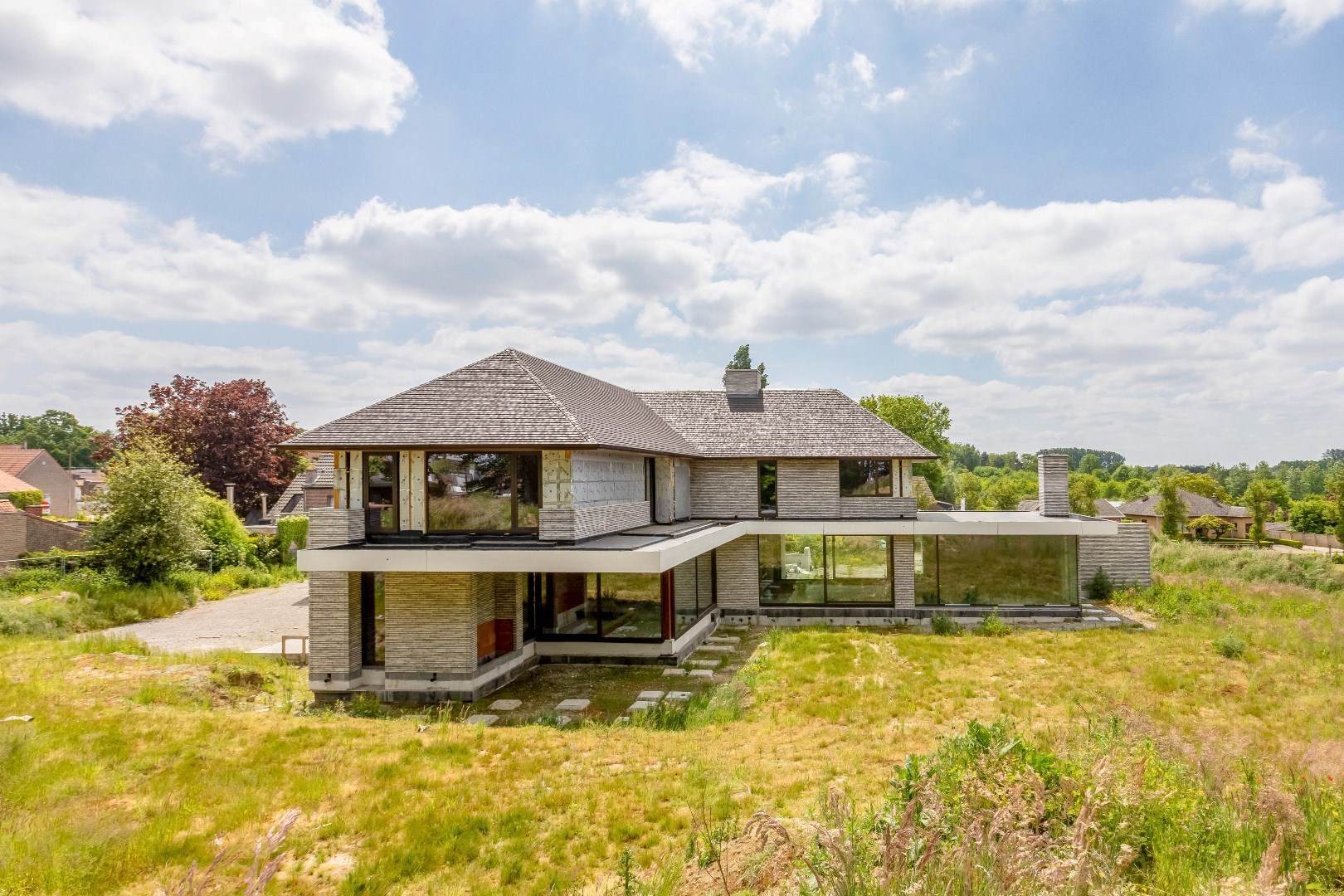 Unieke kans : exclusieve  riante villa  1400m&#178;  by Artea en Piet Bailyu Architects 