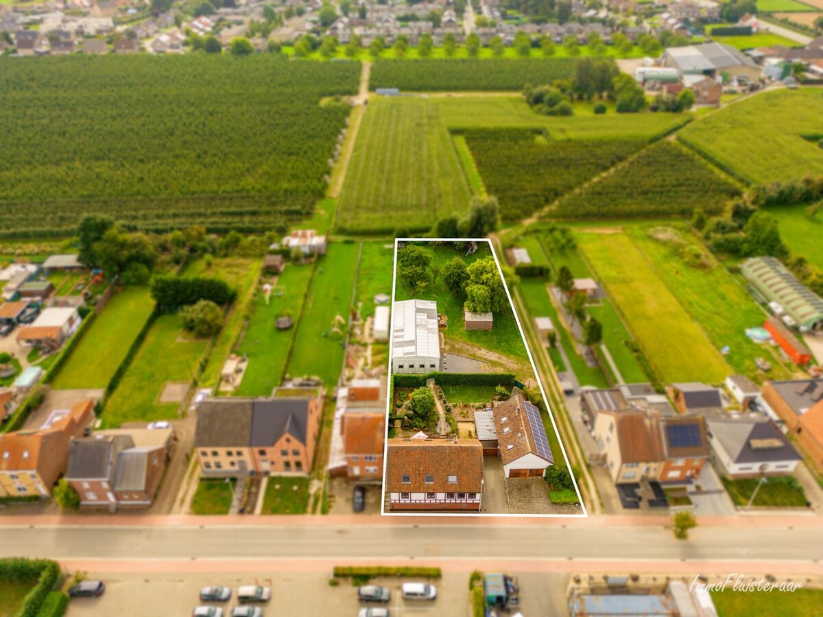 Ruime woning met bijgebouw en een loods op ca. 25 are te Kortessem 