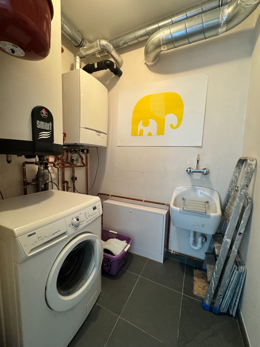 Ruim appartement met ondergrondse garage te koop in hartje Zulte 