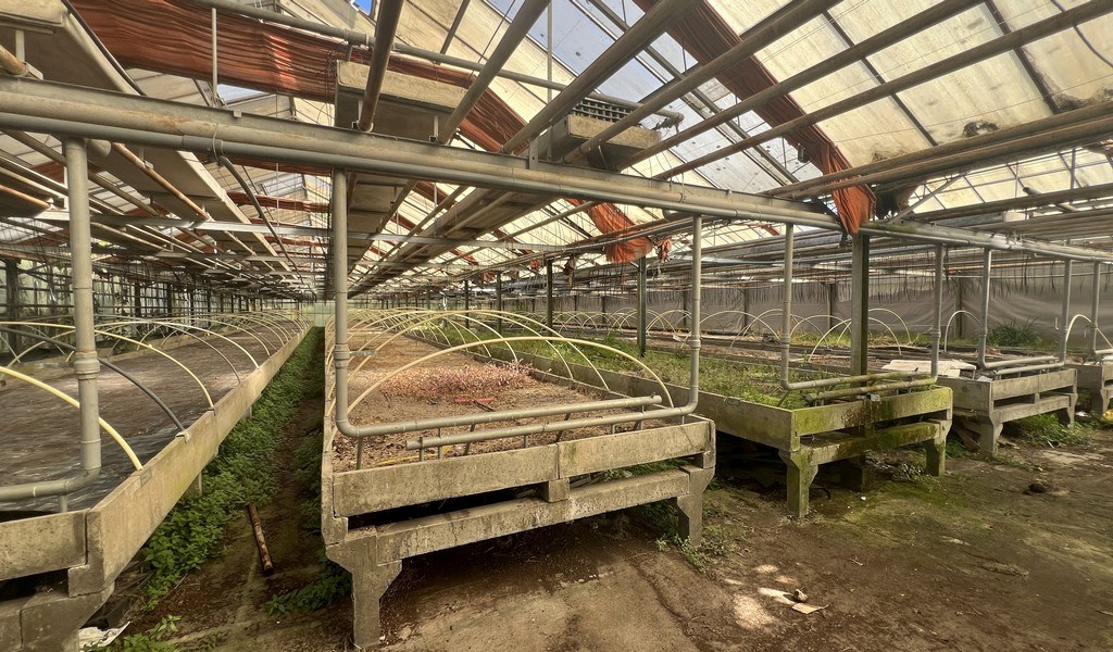 Agrarische grond met serres te koop in Merelbeke