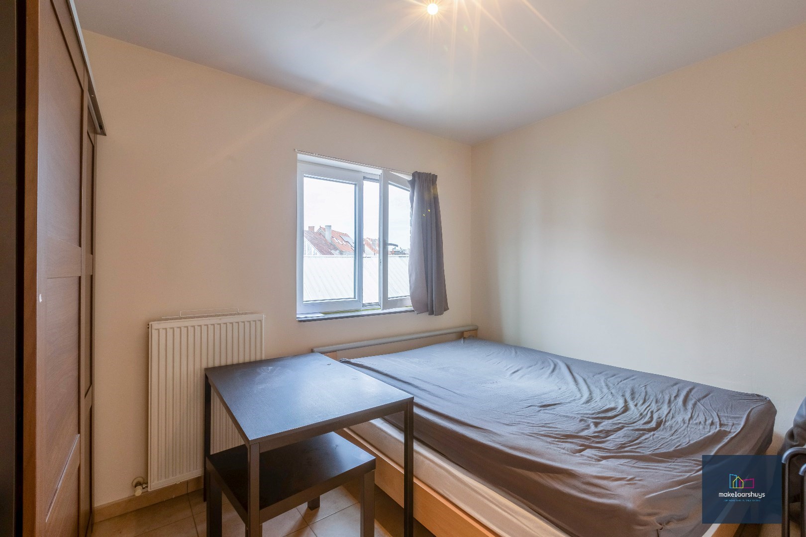 Zeer verzorgd 1-slaapkamerappartement met balkon en staanplaats 