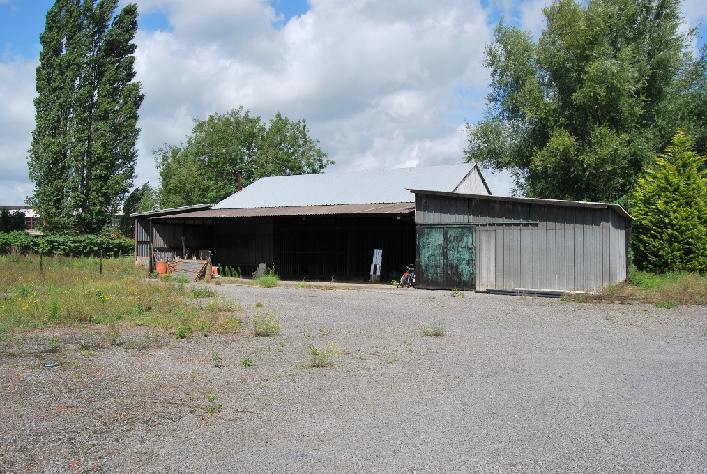 Op te frissen woning met loods op ca. 1,4ha te Deinze 