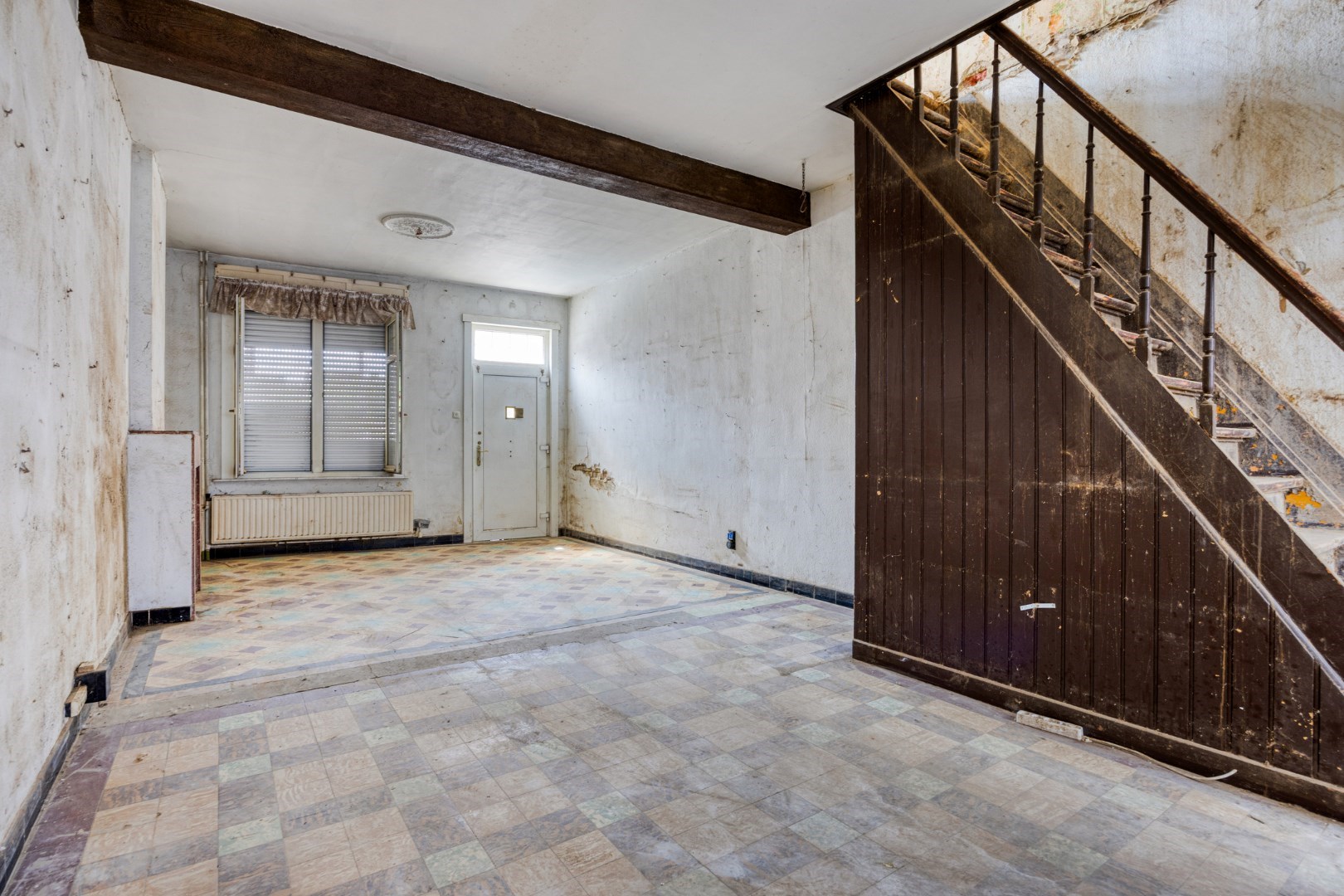 Te renoveren halfopen bebouwing met 3 slaapkamers en ruime tuin in hartje Kessel-Lo 
