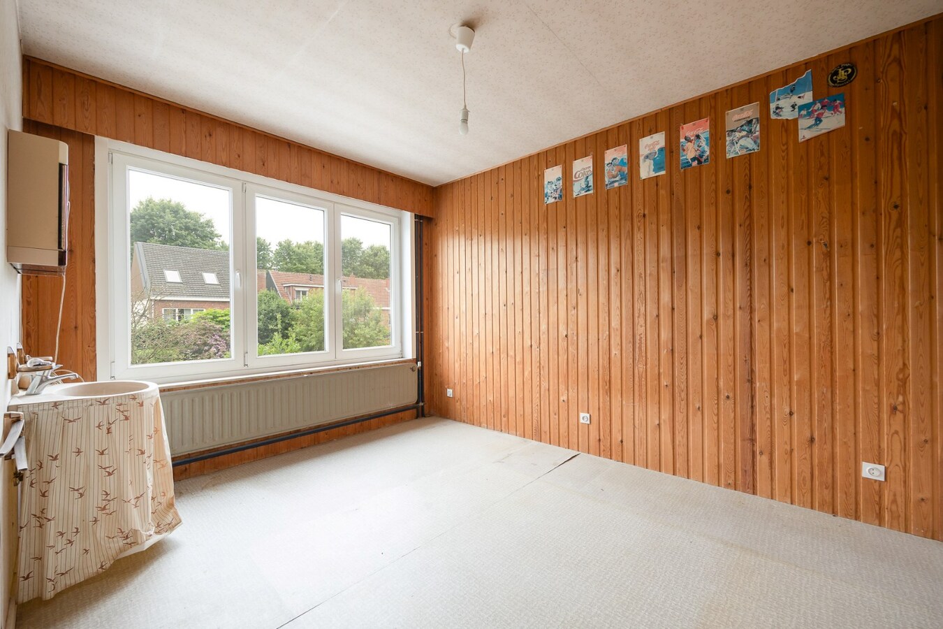 Te renoveren woning met tuin in een rustige wijk te Schoten! 