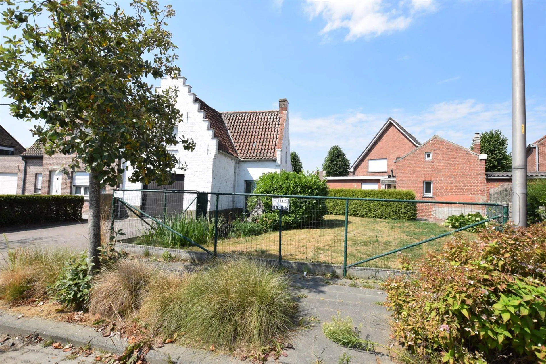 Perceel bouwgrond voor halfopen woning + garage op 250 m² te Keiem.