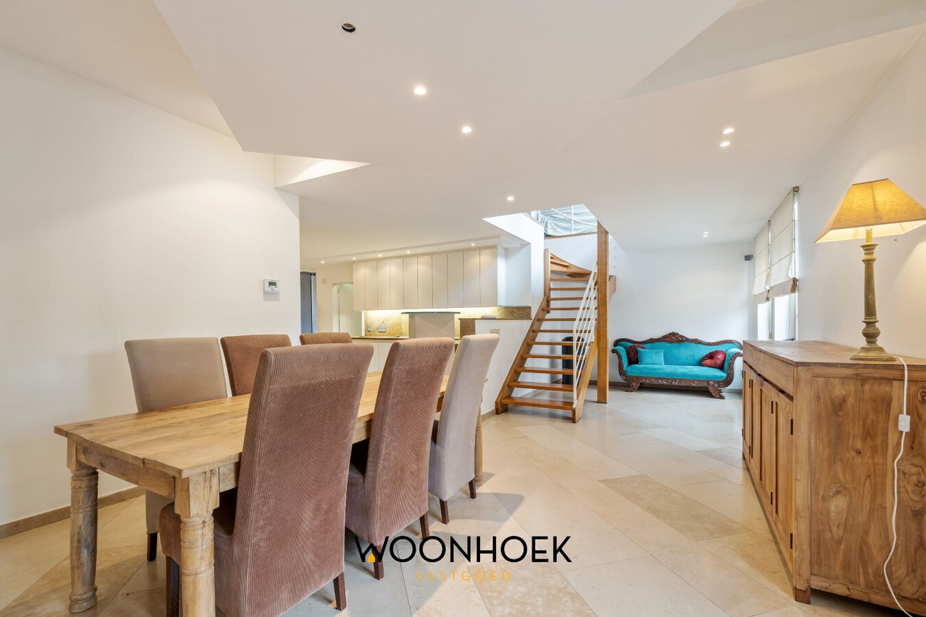 Centraal gelegen woning met handelsruimte te Lokeren 