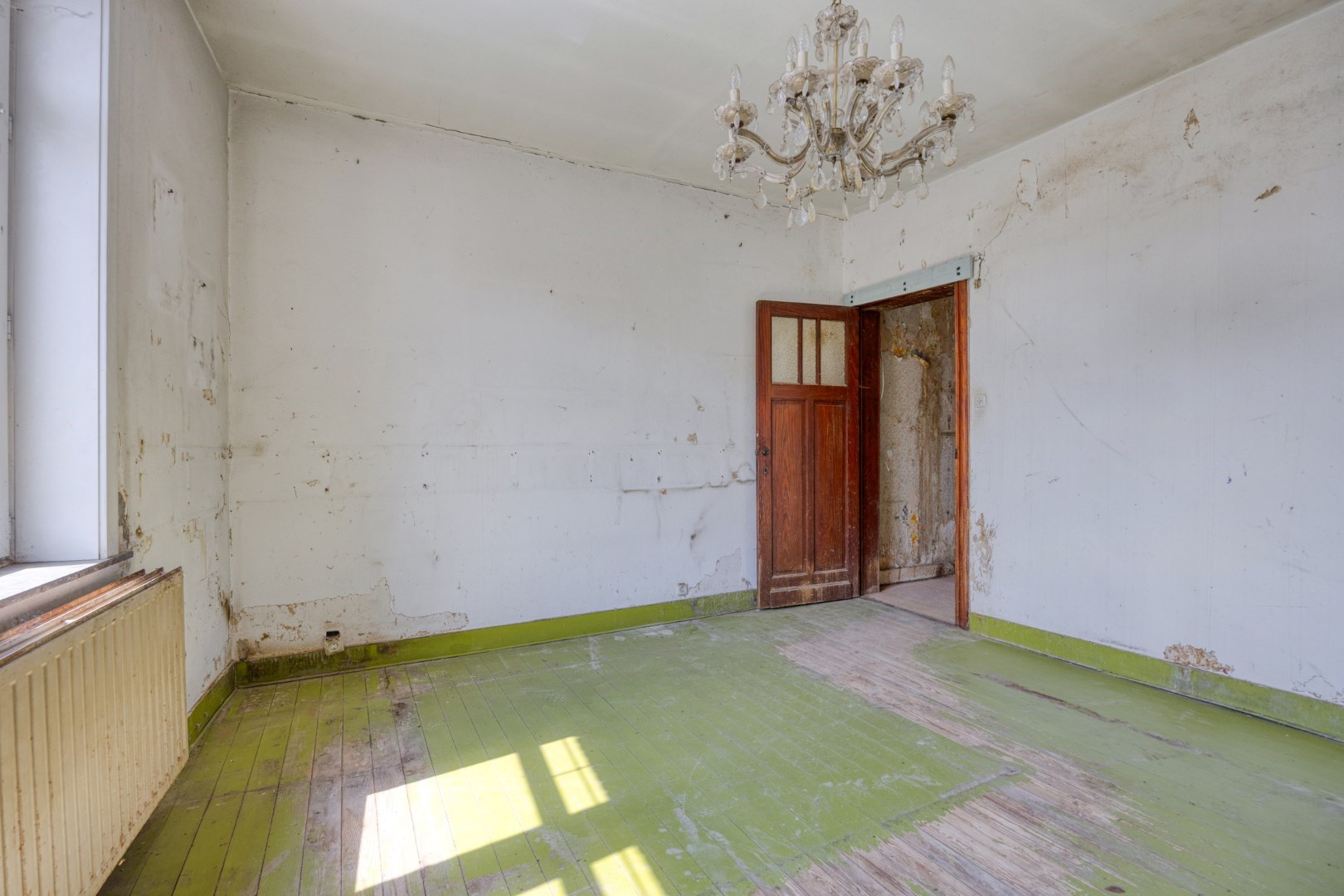 Te renoveren halfopen bebouwing met 3 slaapkamers en ruime tuin in hartje Kessel-Lo 