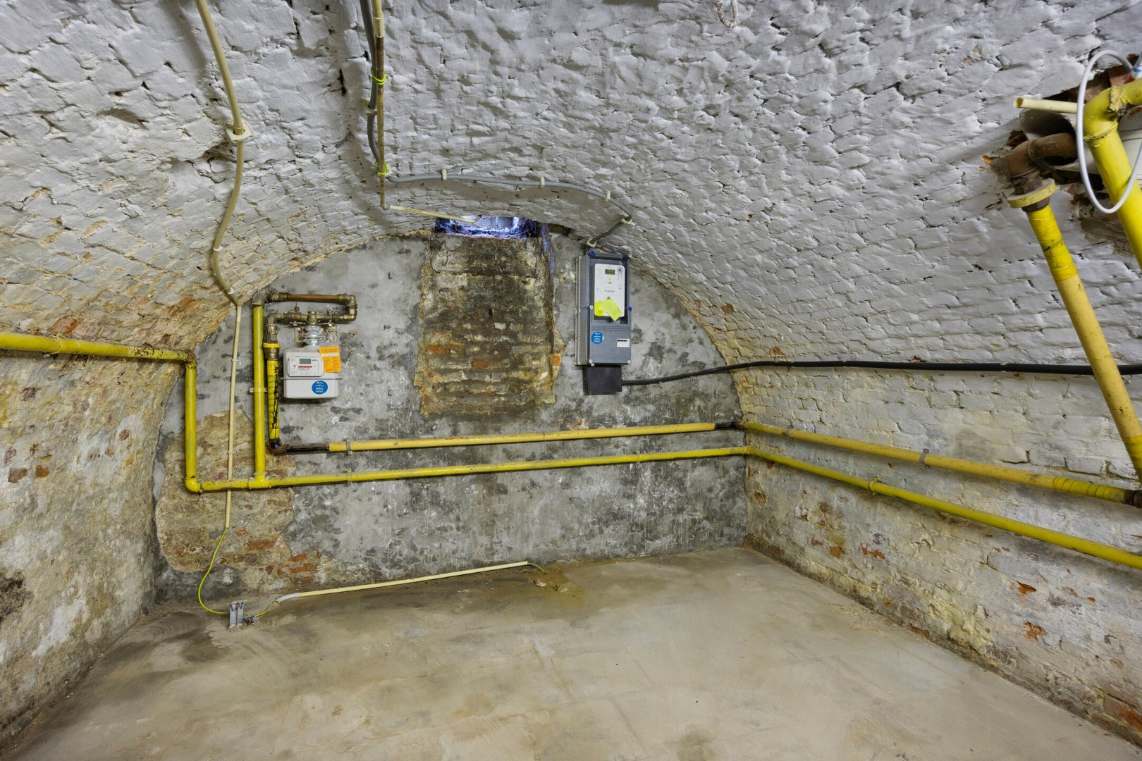 Halfopen hoekwoning met garage en dakterras op toplocatie in Kessel-Lo – renovatieproject met veel potentieel 