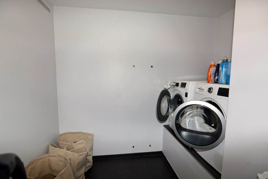 Moderne, energiezuinige woning met 4 slpks op 7a 7ca. 