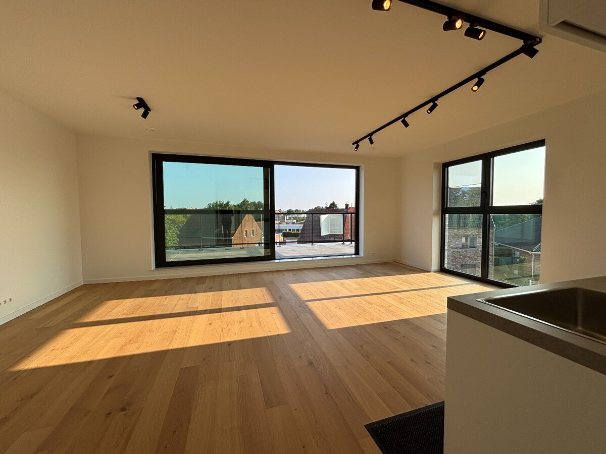 Stijlvol nieuwbouwappartement met zonneterras en garage in het hart van Sint-Antonius 