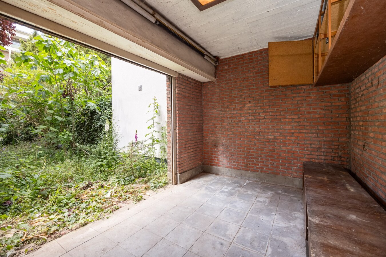 Te renoveren bel-&#233;tage met tuin in de Tentoonstellingswijk! 
