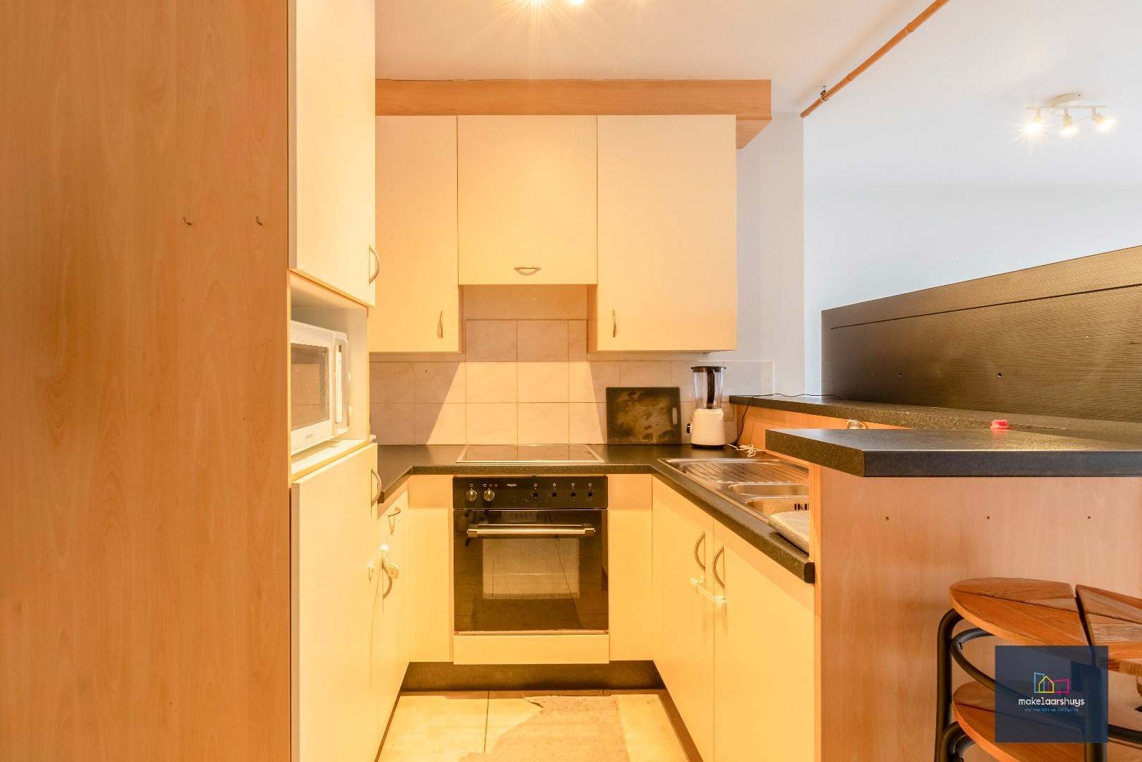 Zeer verzorgd 1-slaapkamerappartement met balkon en staanplaats 