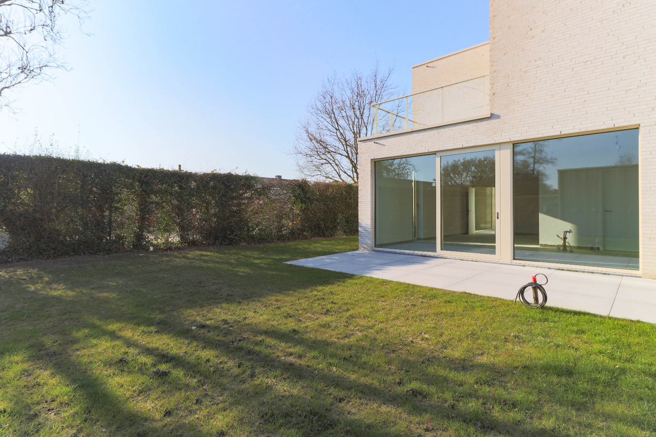 Moderne nieuwbouwwoningen met garage in groene omgeving te Kuurne 