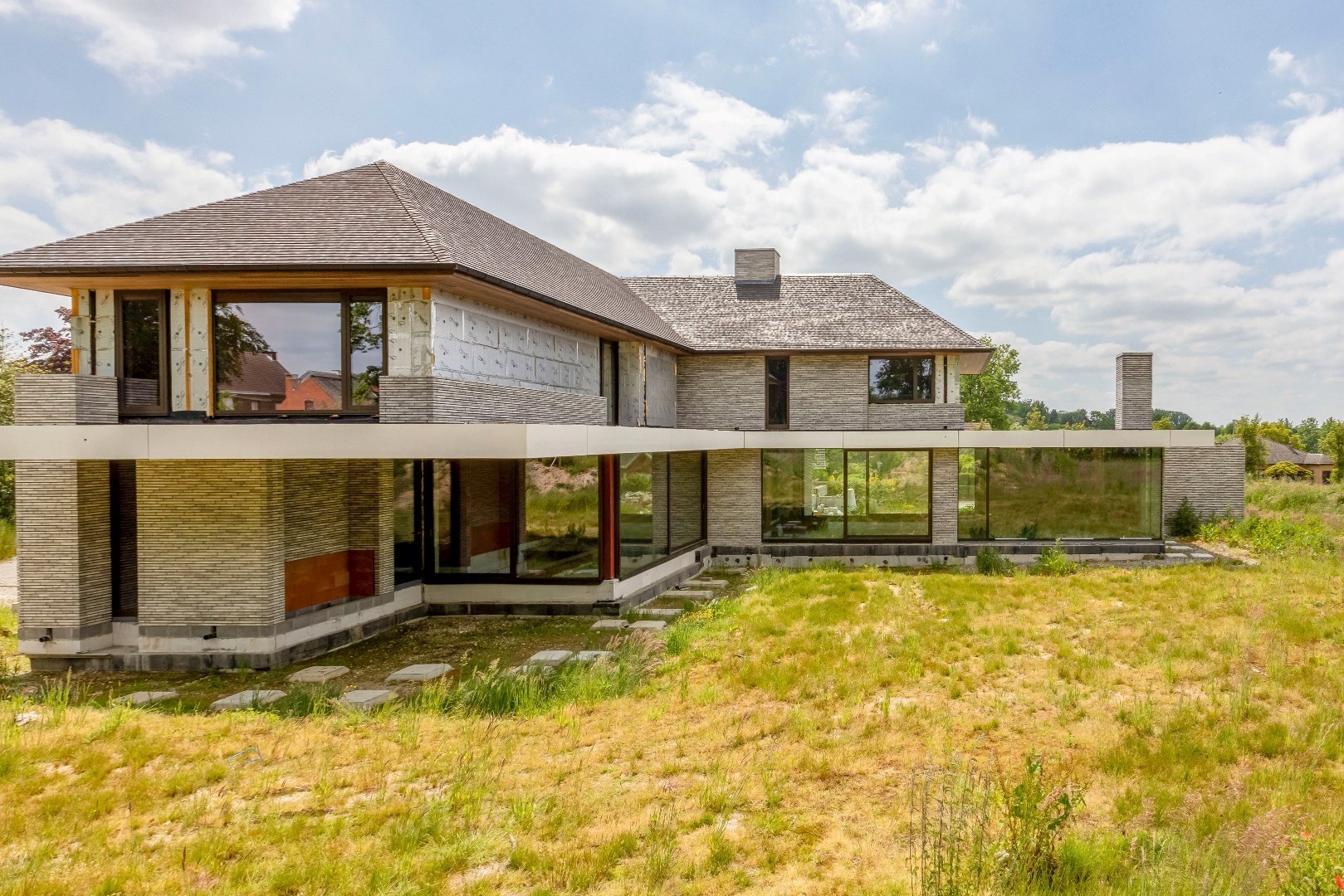 Unieke kans : exclusieve  riante villa  1400m&#178;  by Artea en Piet Bailyu Architects 
