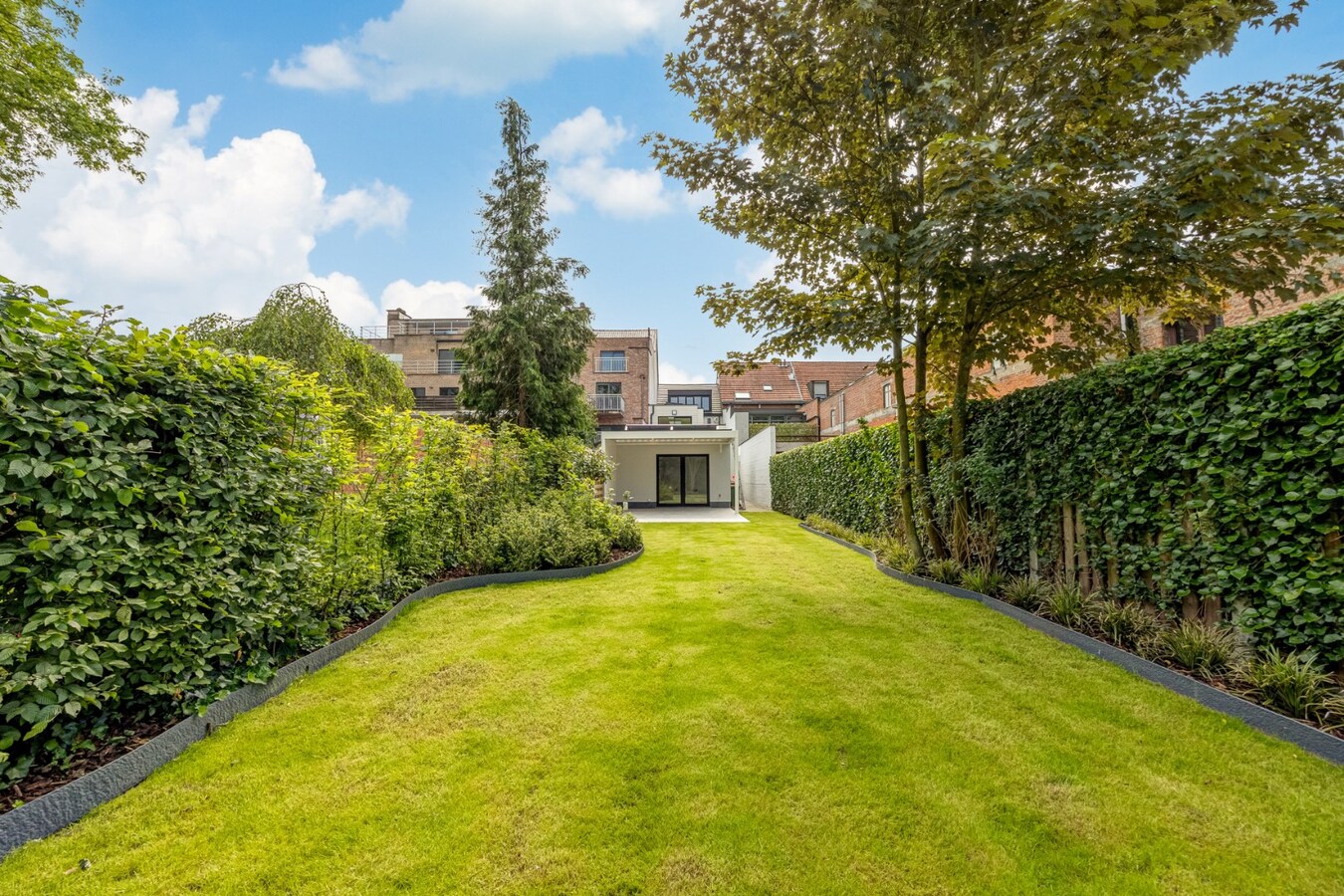 Uniek appartement in centrum Schilde met prachtige tuin 