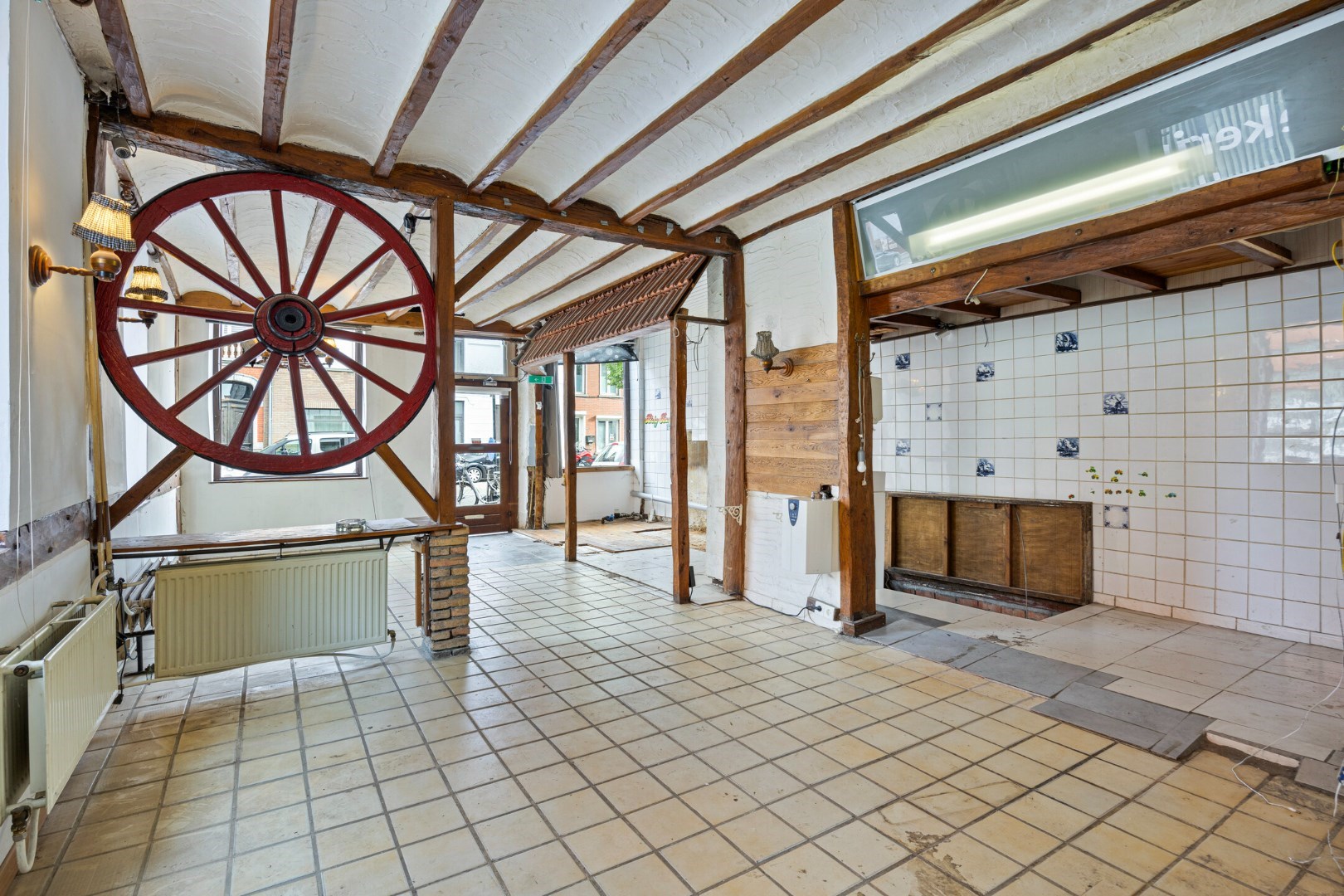 Halfopen hoekwoning met garage en dakterras op toplocatie in Kessel-Lo – renovatieproject met veel potentieel 