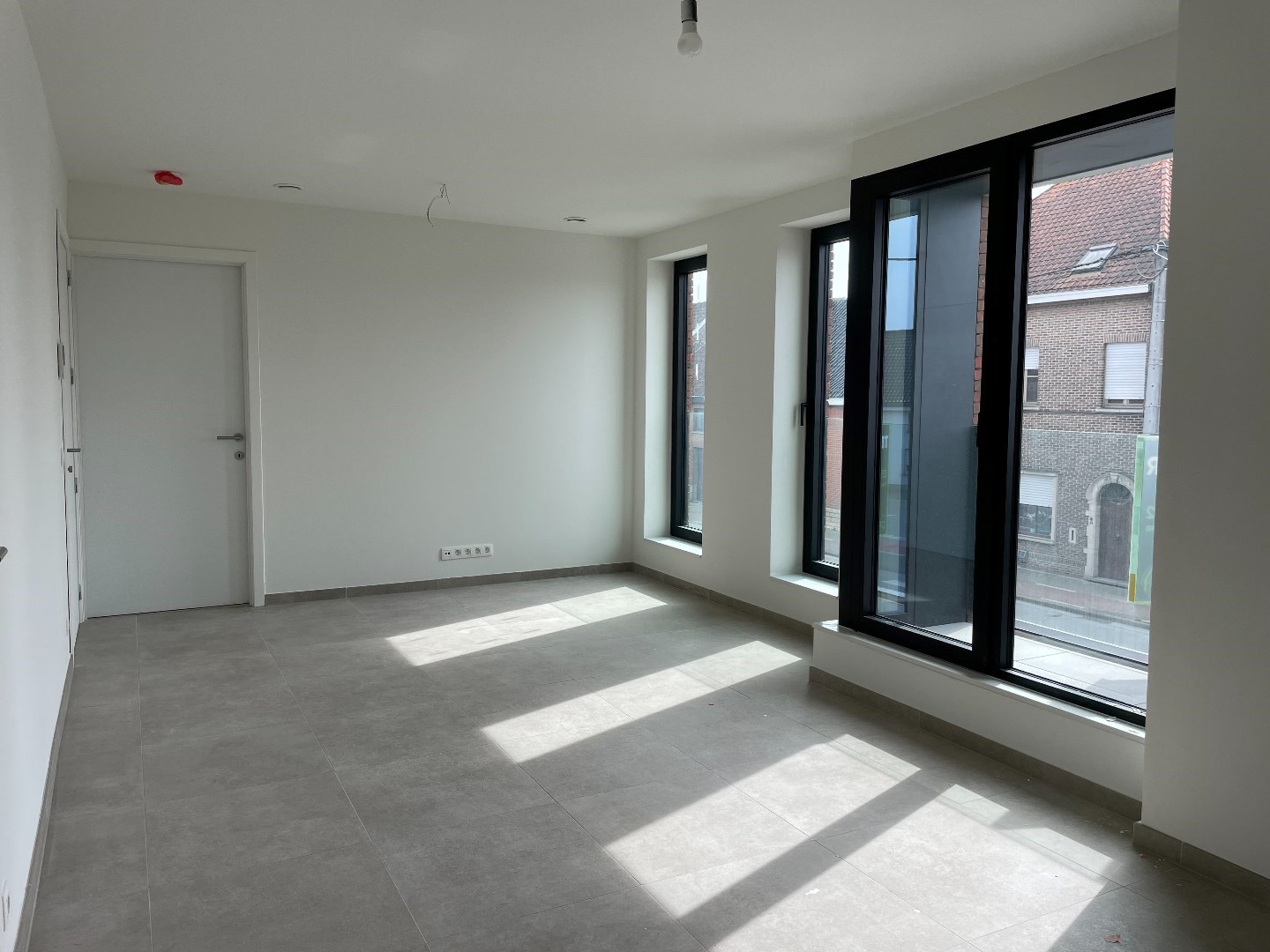 Nieuwbouw appartement met 1 slaapkamer en terras te Desselgem. 