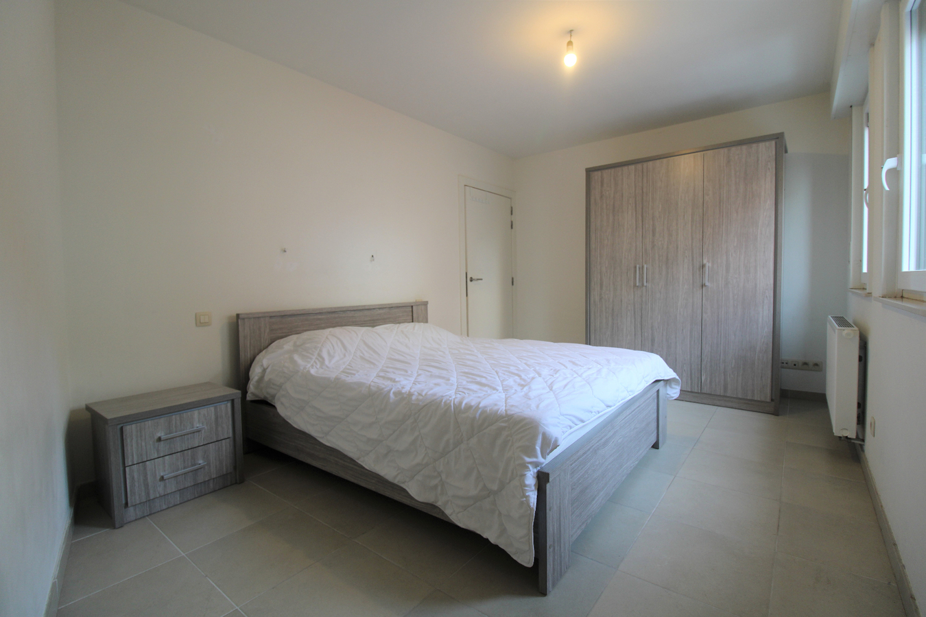 Appartement met twee slaapkamers en autostaanplaats in centrum Roeselare 