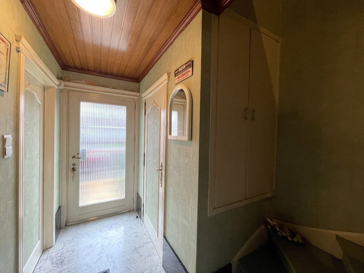 Stevige rijwoning met 3 slaapkamers met tuin en garage te Rumbeke 