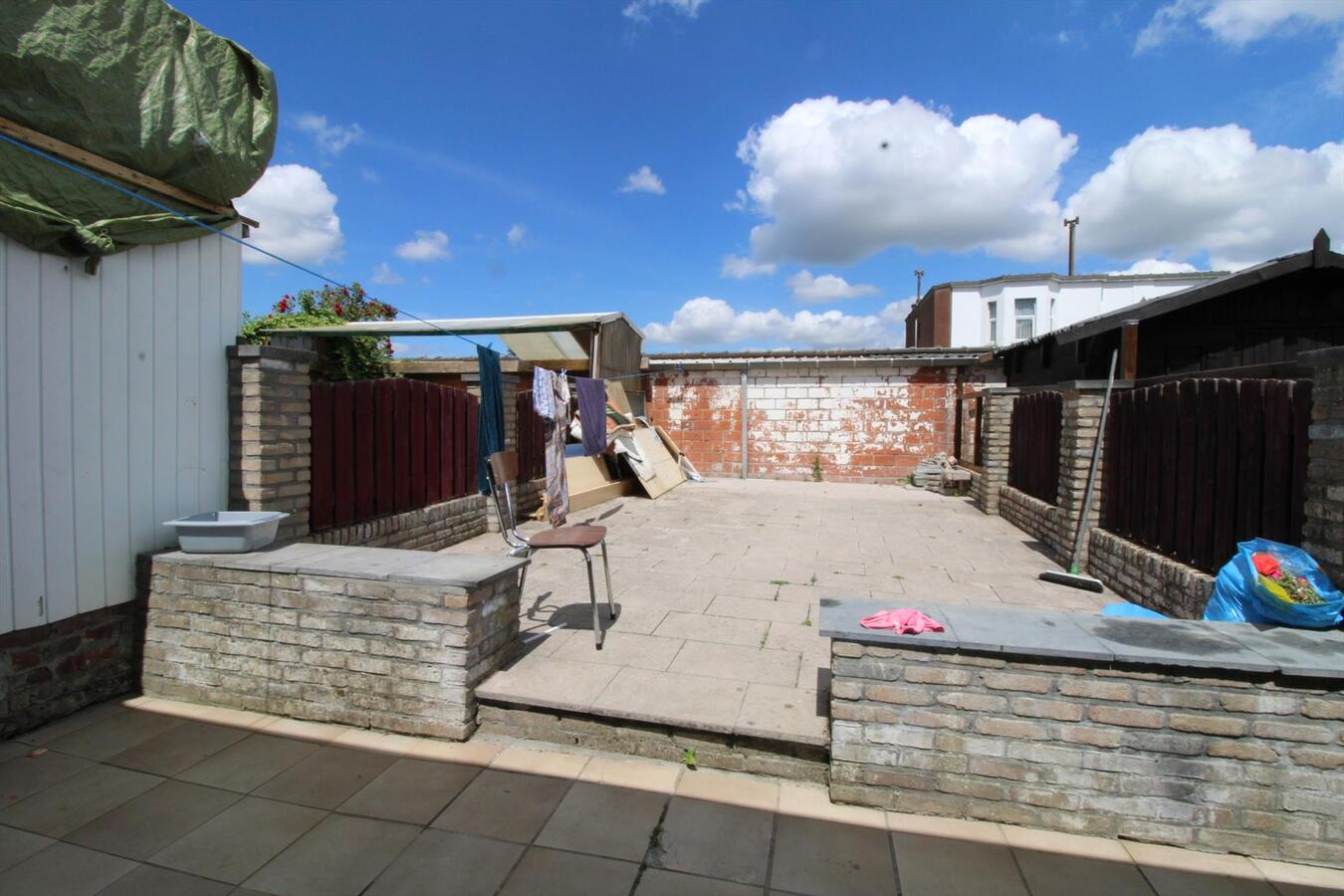 Rijwoning met terrastuin en 2 slaapkamers te Menen 