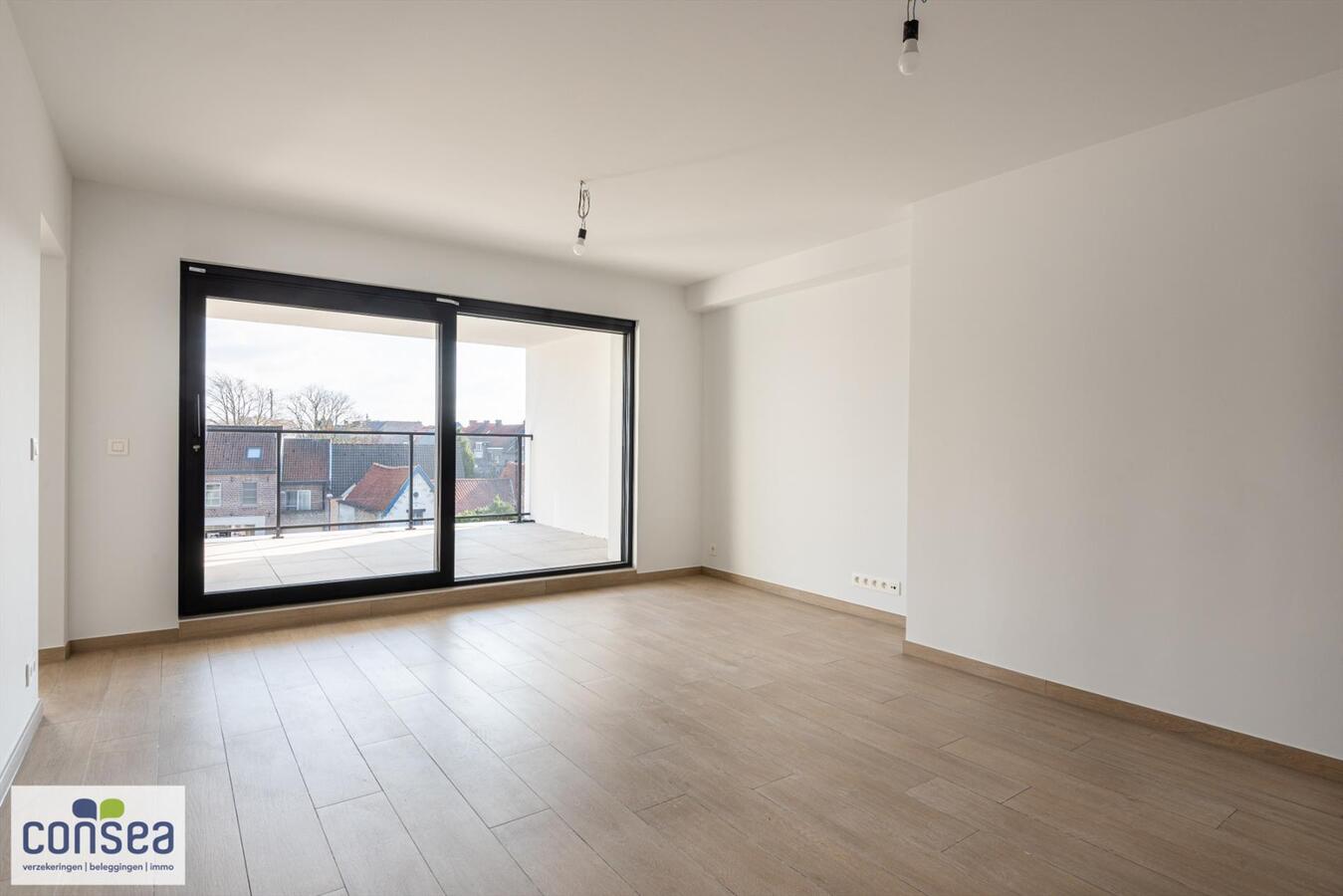 Lichtrijk appartement in het centrum van Maldegem met zicht op de kerk en overdekt terras van 15m&#178; 