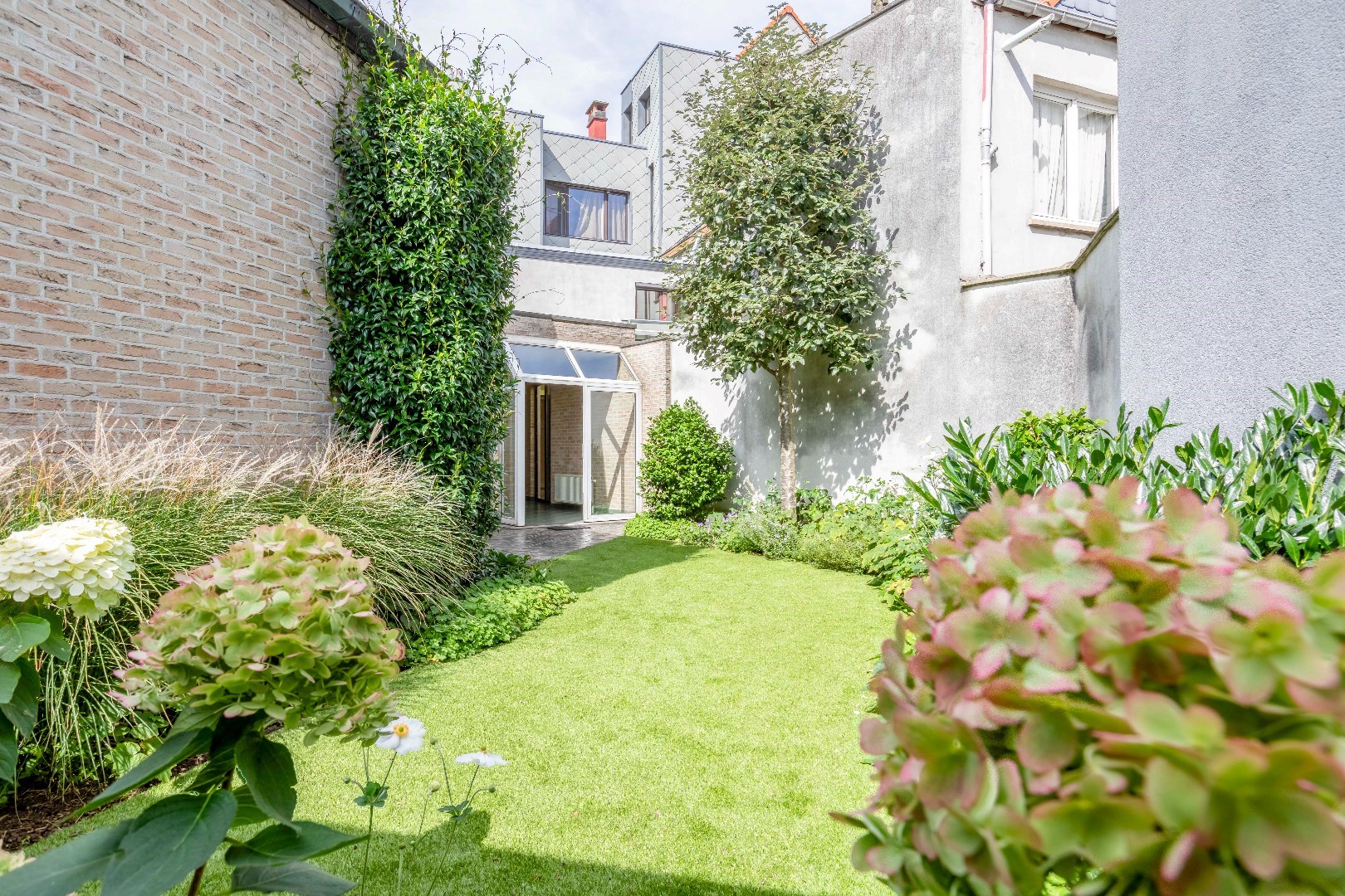 Ruime woning met tuin en dubbele garage in Gent - ideale woning voor cohousing 