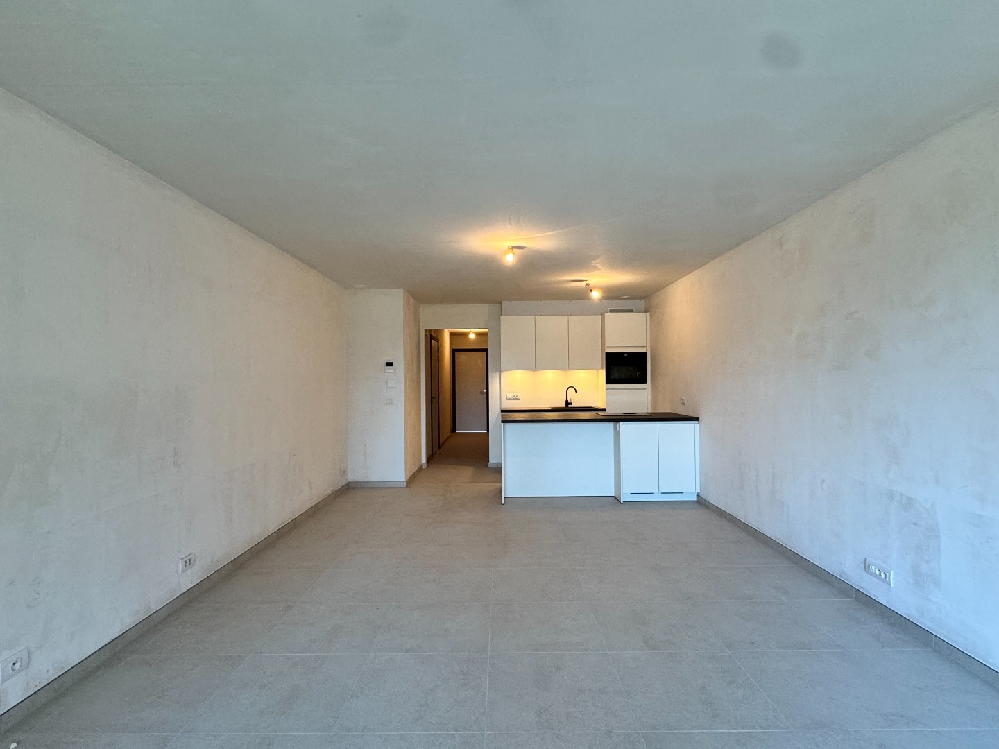 Nieuwbouwappartement met twee slaapkamers, terras en ondergrondse autostaanplaats te koop in Zulte 