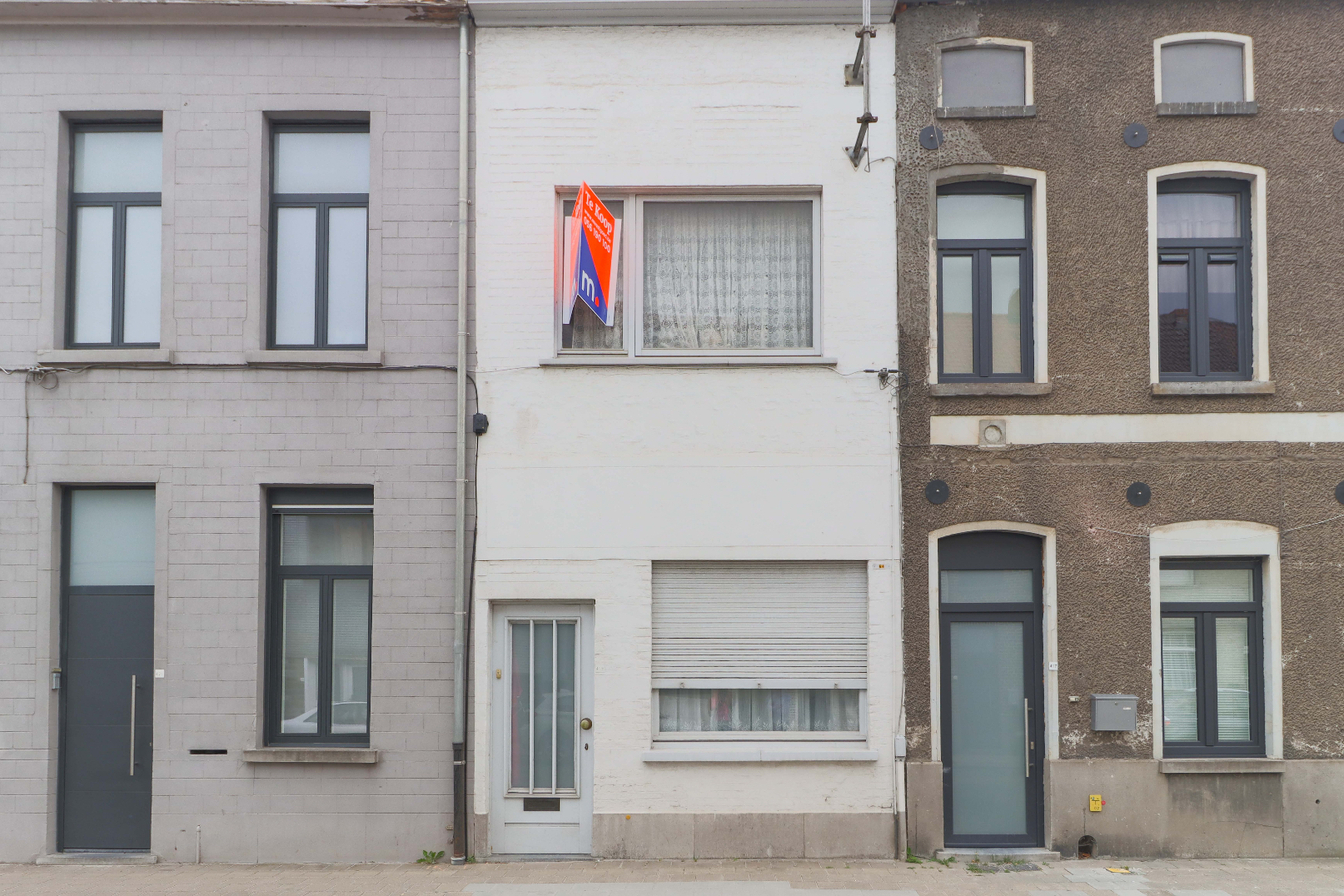 Woning met veel potentieel en 4 slaapkamers te Kortrijk! 