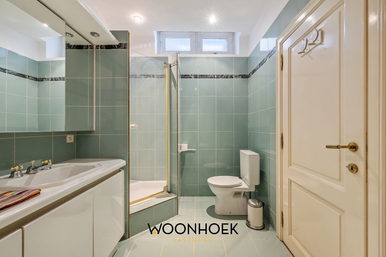 Centraal gelegen woning met handelsruimte te Lokeren 