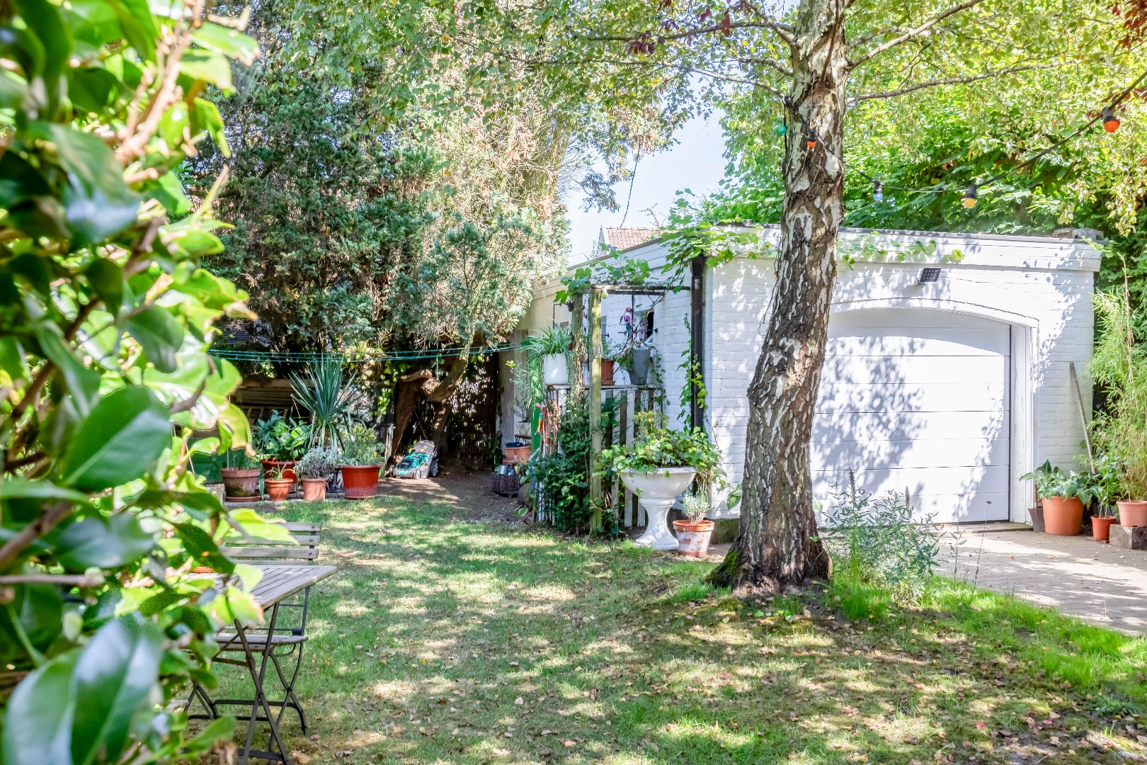 Woning met 4 slpkamers, leuke tuin en garage te Mariakerke 