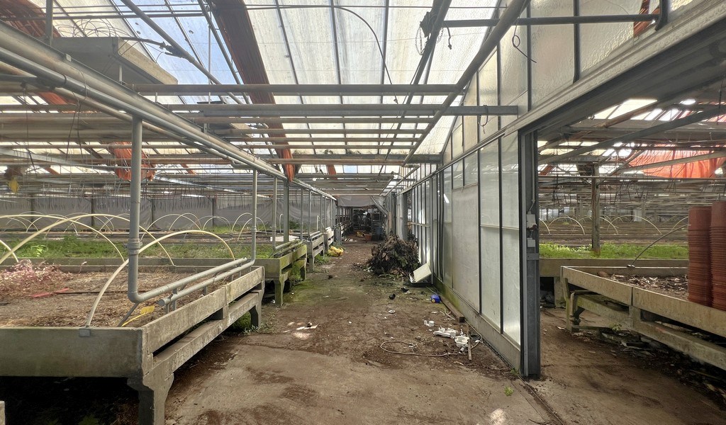 Agrarische grond met serres te koop in Merelbeke