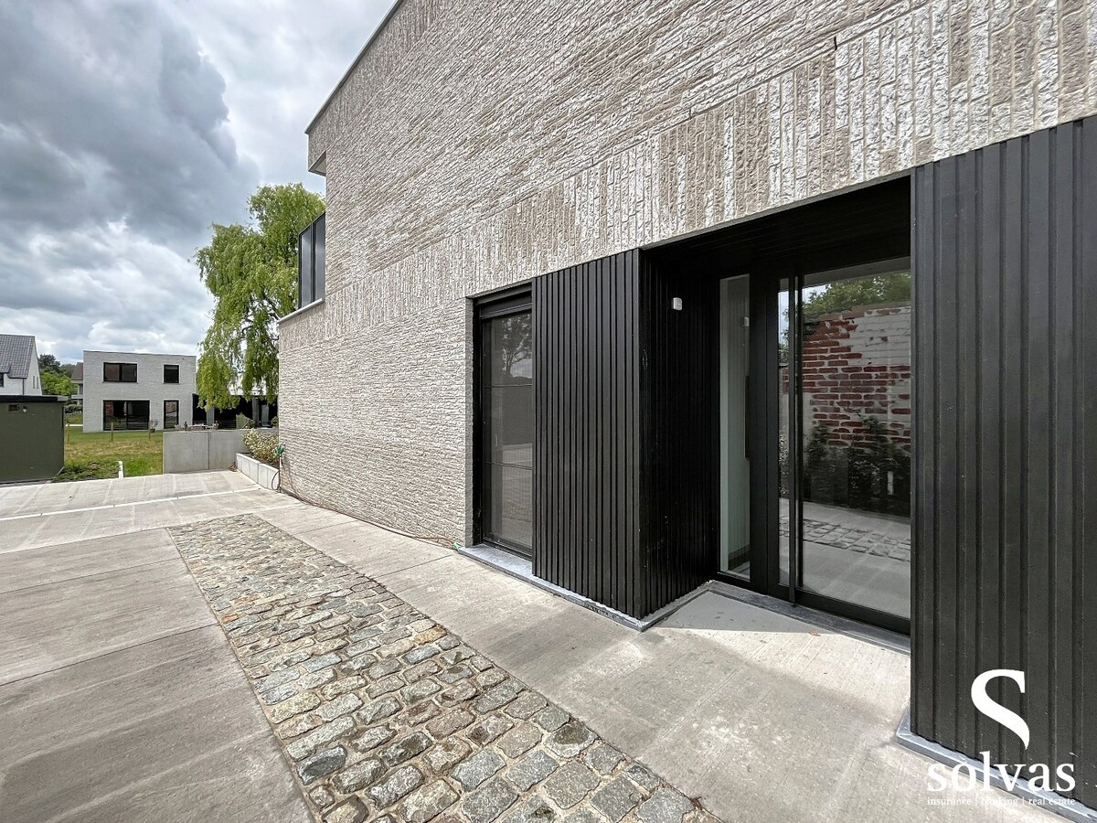 Ruim nieuwbouwappartement met tuin, terras, garage en 3 slaapkamers op prachtige locatie (Vaart) te Bellem 