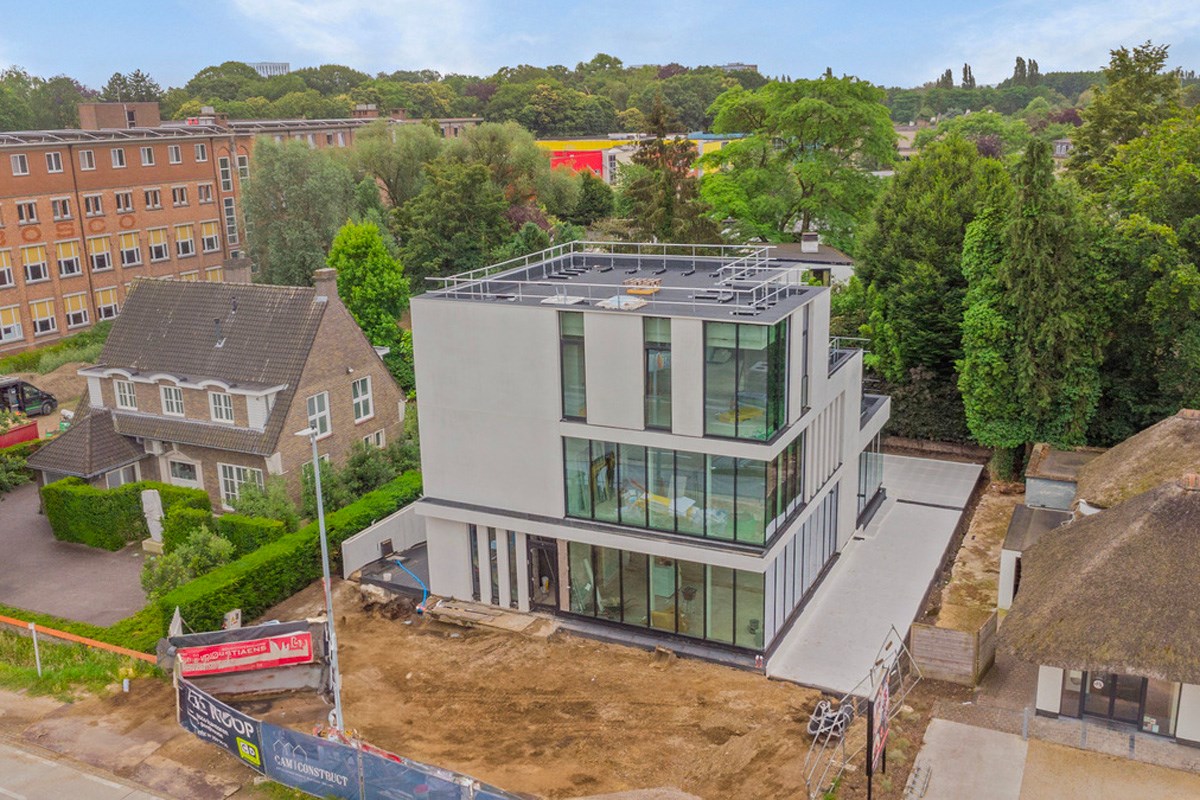 Nieuwbouw kantoorgebouw met appartement te koop in Gent