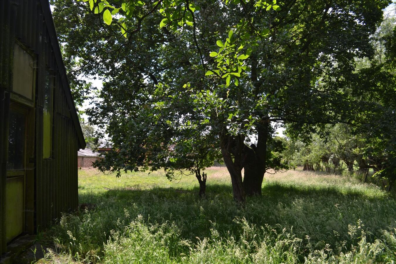 Charmante hoeve op ca. 0,63Ha te Lokeren, deels gelegen in woongebied. 