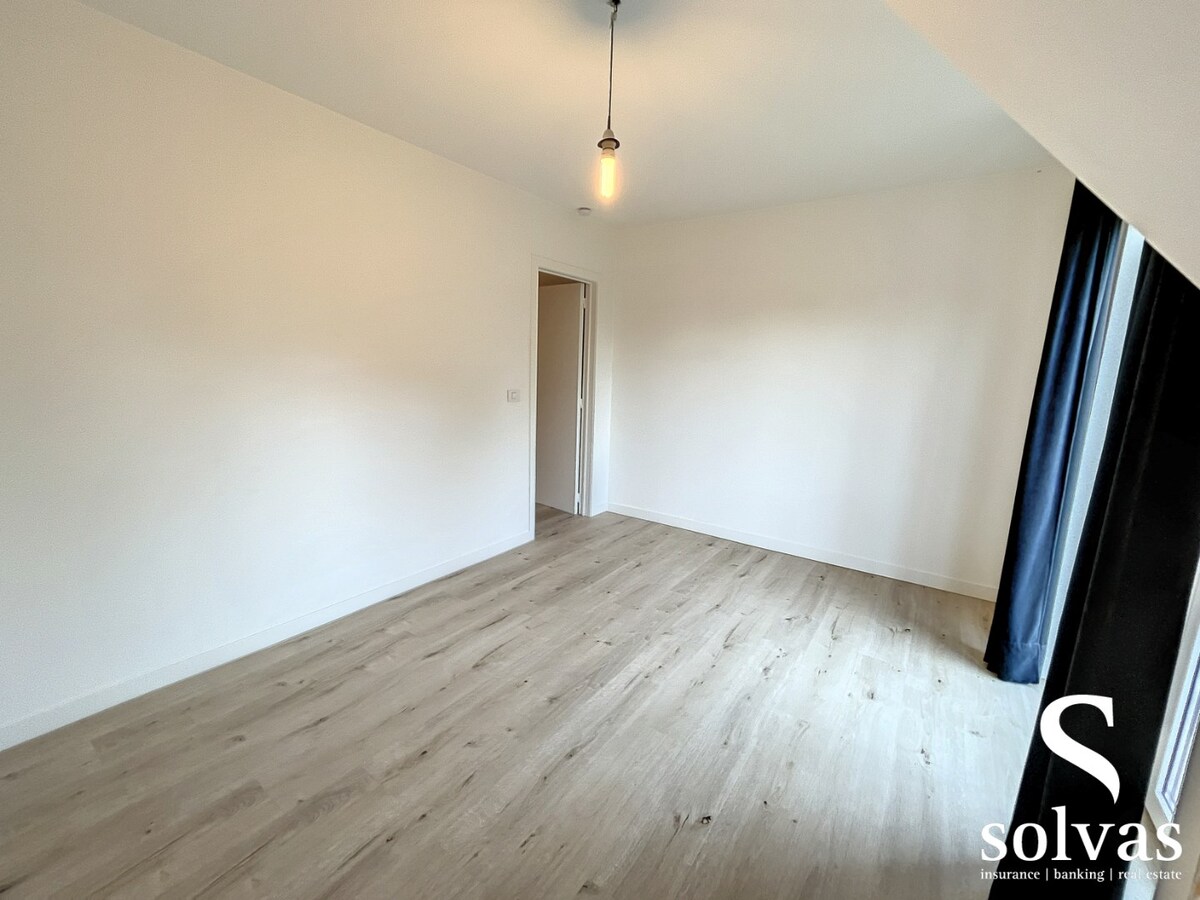 Ruim dakappartement in centrum Knesselare 