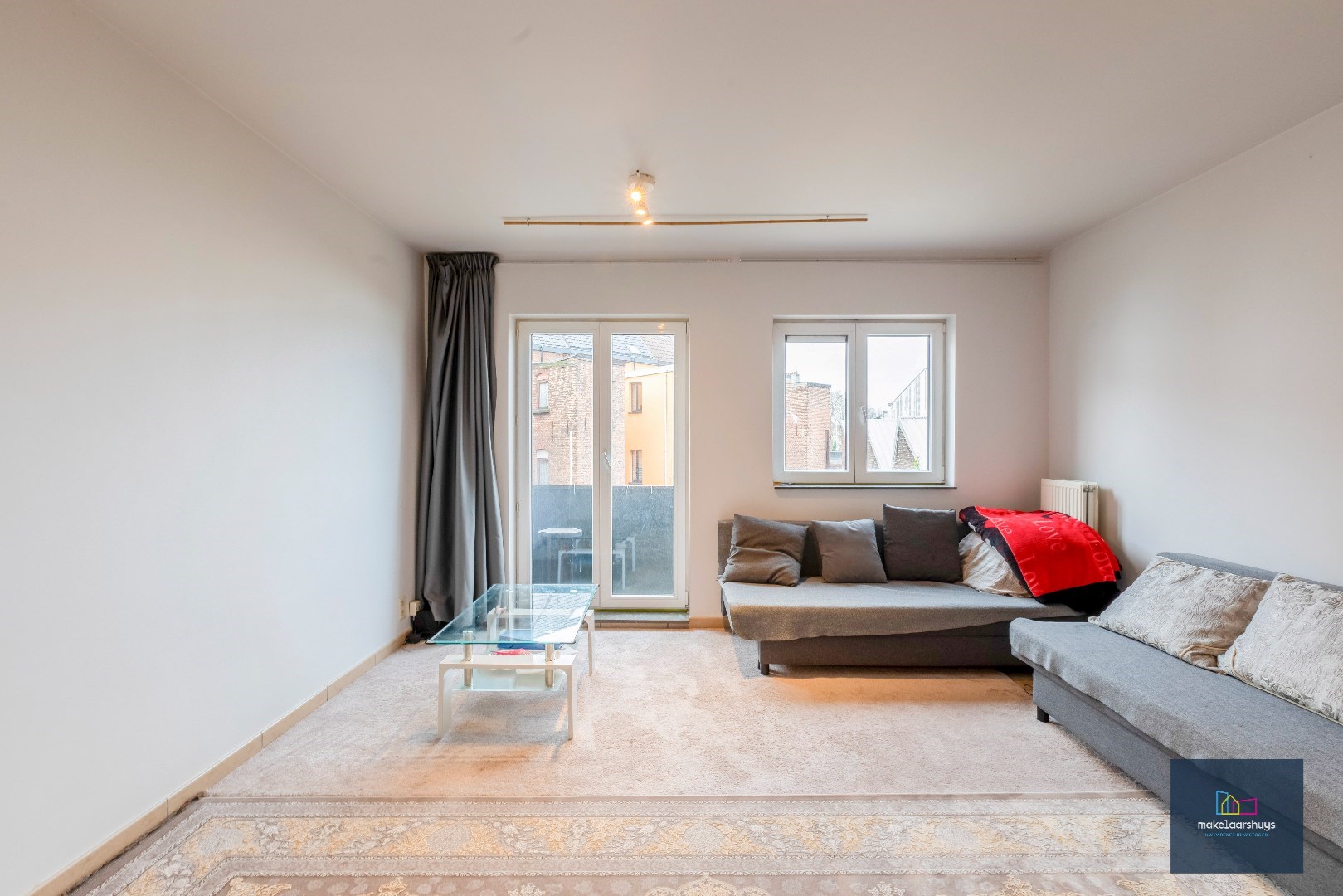 Zeer verzorgd 1-slaapkamerappartement met balkon en staanplaats 