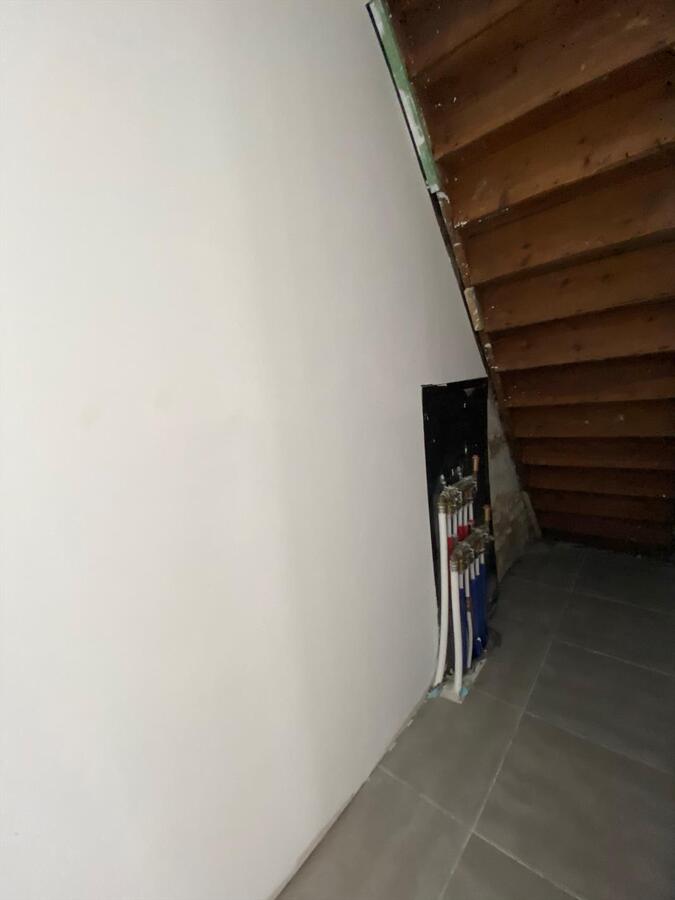 Gerenoveerde woning met garage en tuin te Koekelare 