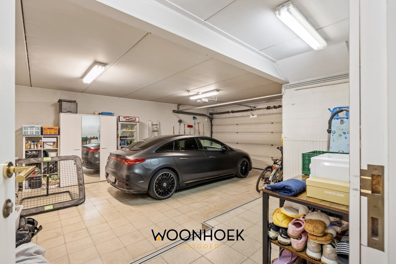 Centraal gelegen woning met handelsruimte te Lokeren 