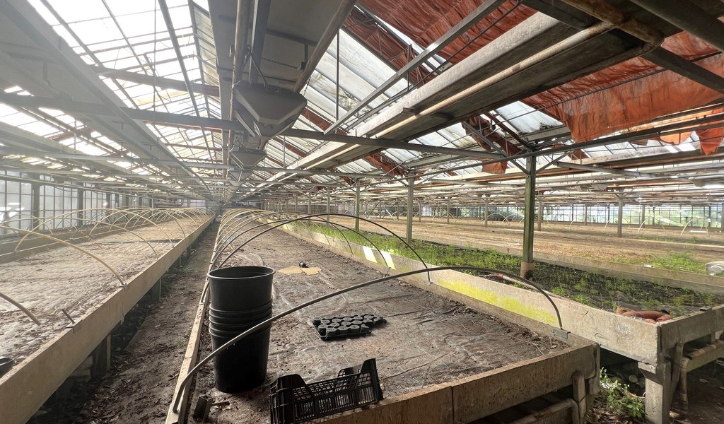 Agrarische grond met serres te koop in Merelbeke
