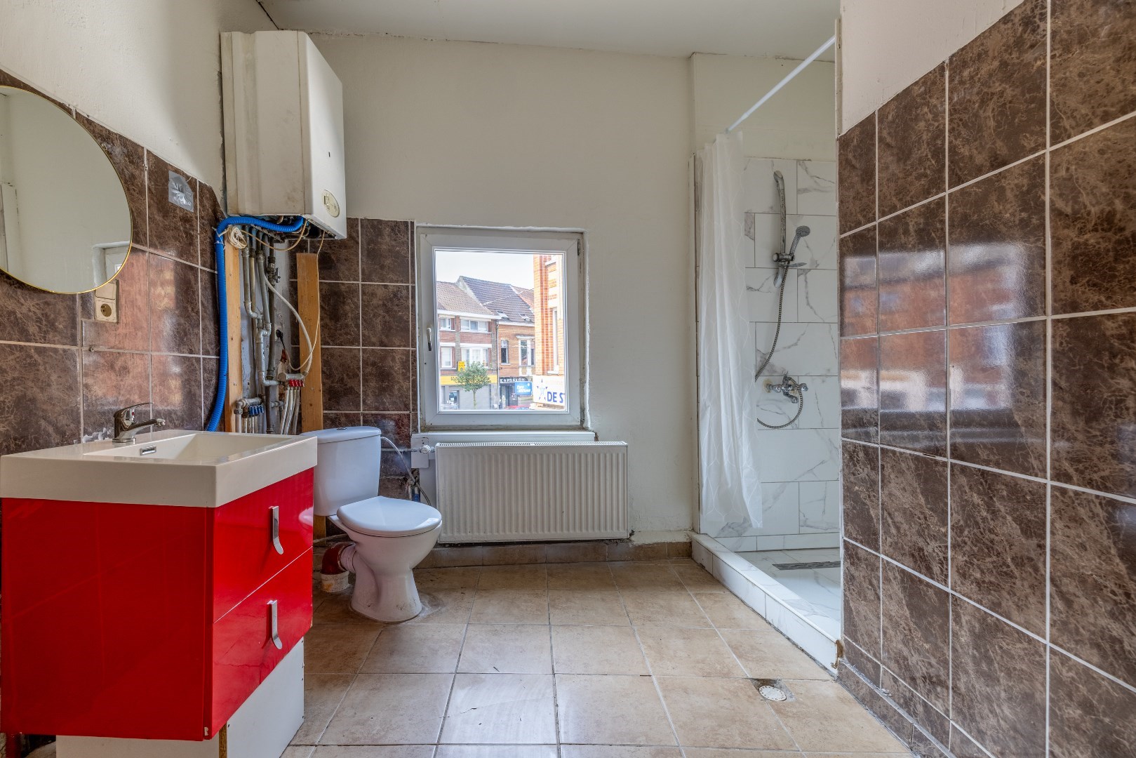 Te Renoveren Hoekwoning met Handelsgelijkvloers op Edmond Van Beverenplein 9, Gent 