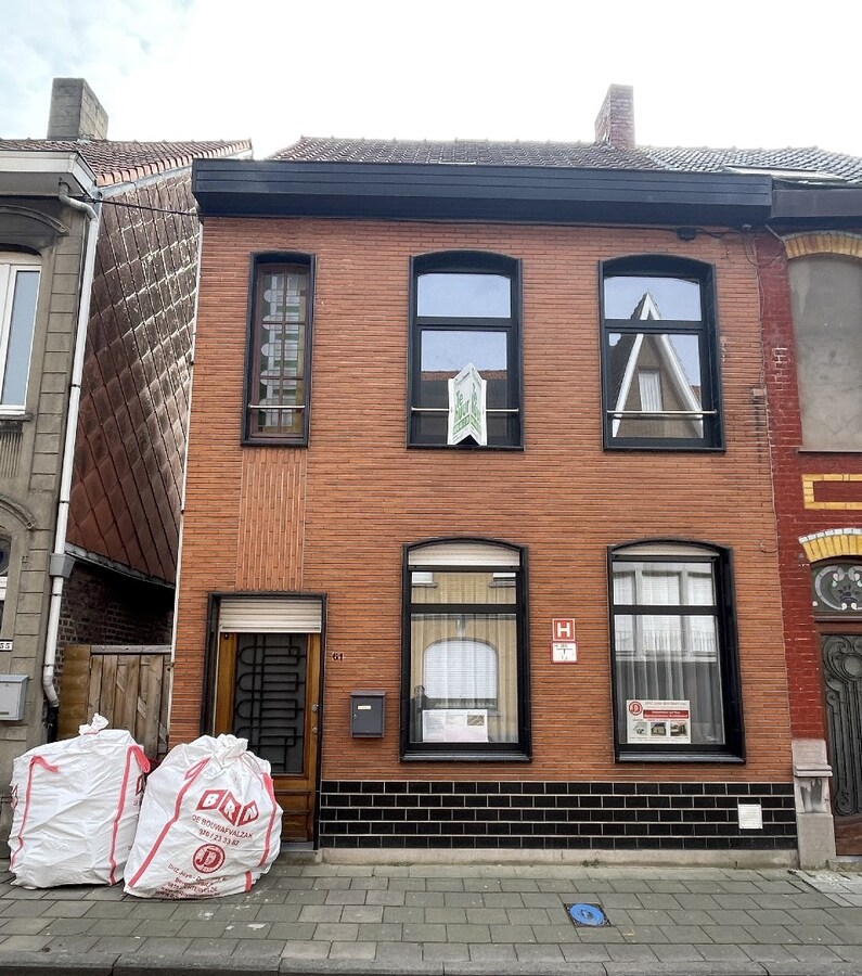 Centraal gelegen rijwoning met twee slaapkamers en tuin 